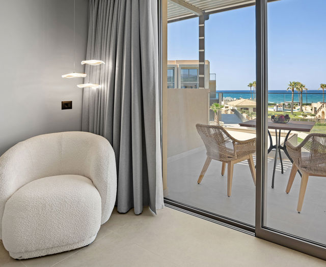 Ventale Island Breeze Resort Premium Double Sea View armchair and balcony view